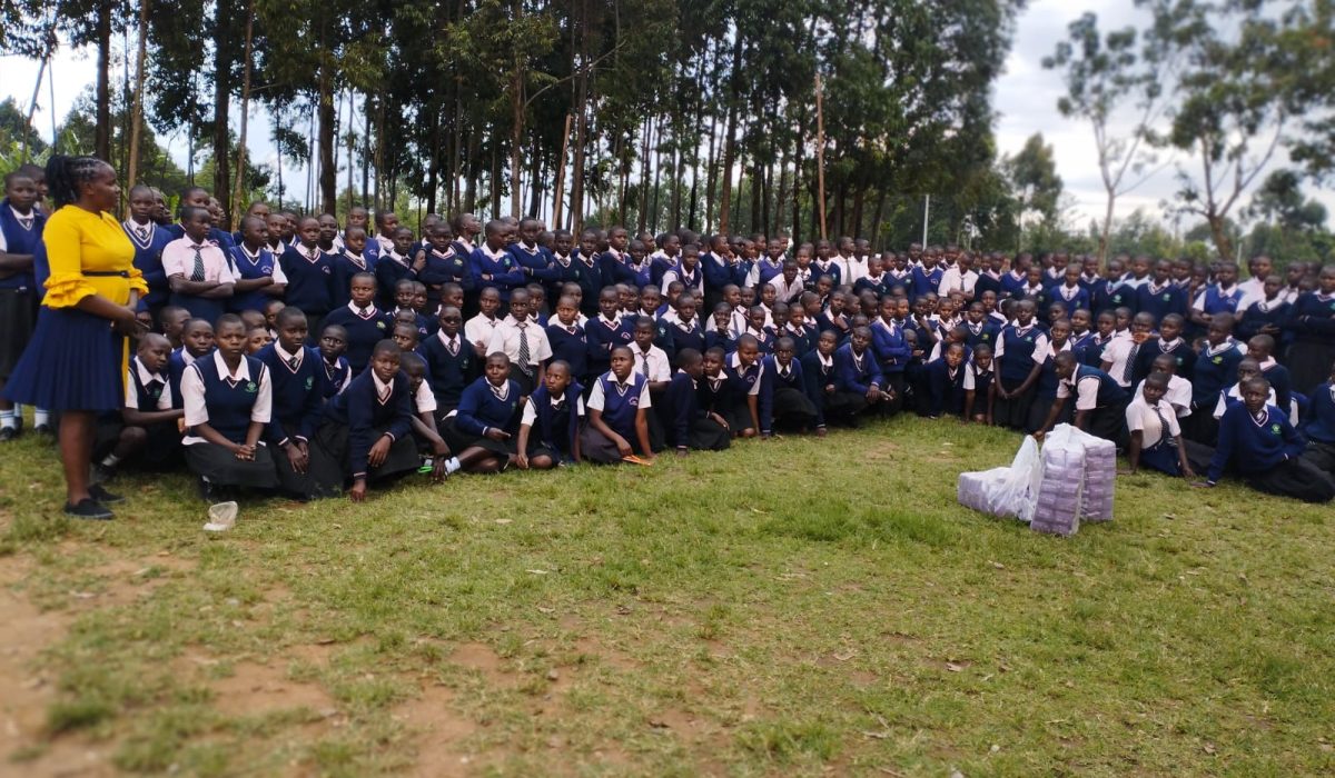 Distribution of softcare sanitary towels to girl students