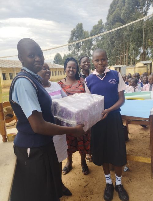 School girls receiving sanitary towels frim Abundant Hope Kenya